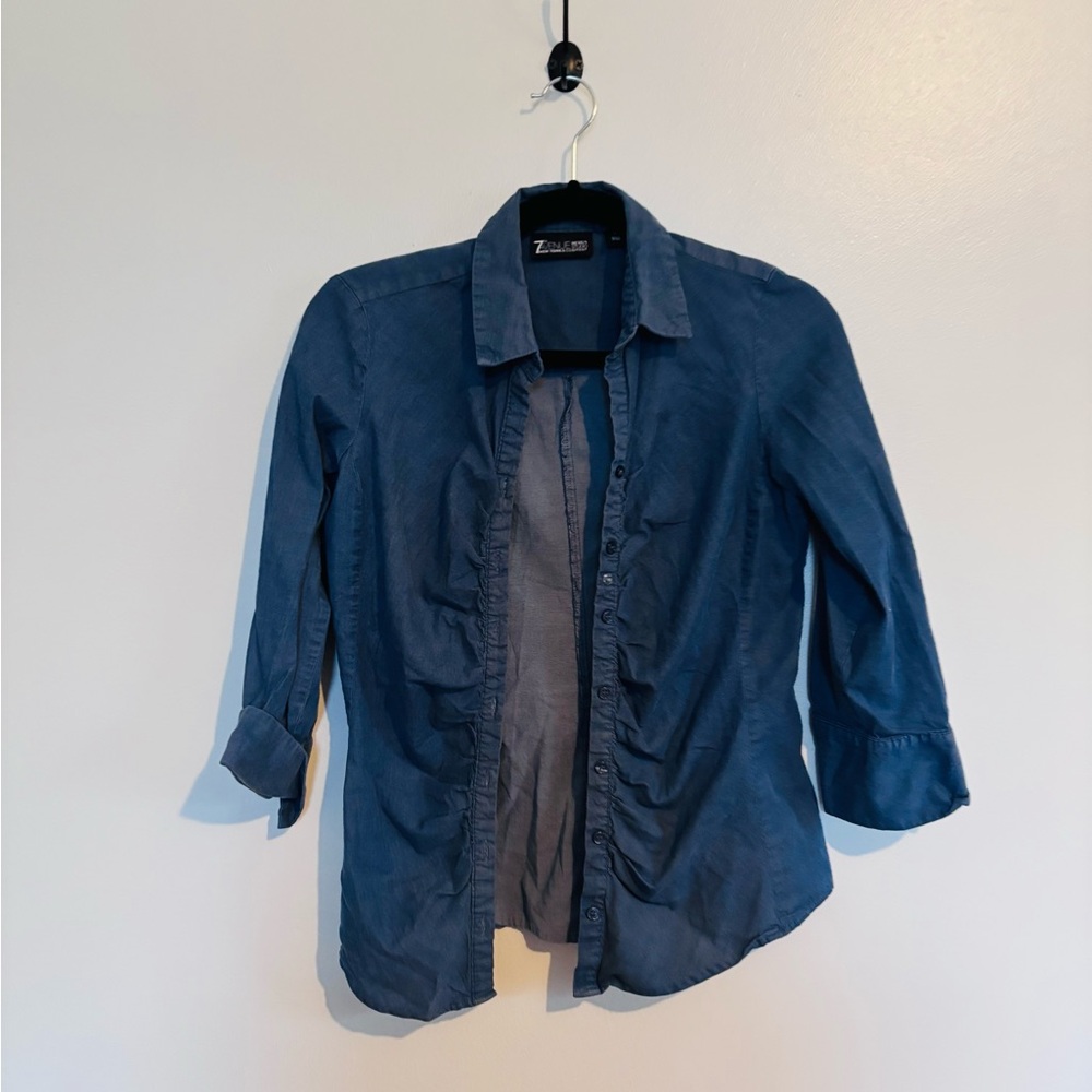 New York & Company blue button up shirt with shirring detail along the buttons
